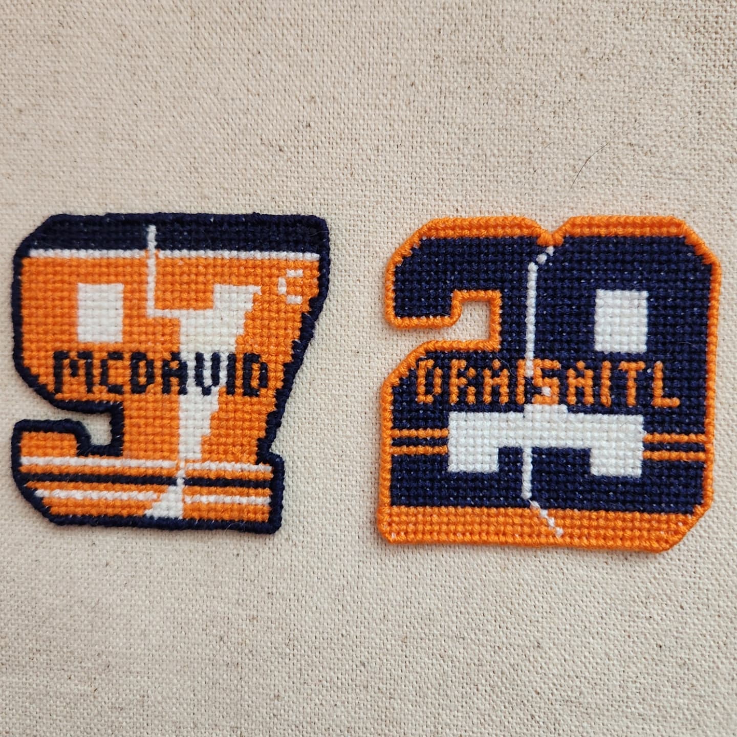 Example cross-stitch piece 2: a cozy cabin in a winter scene